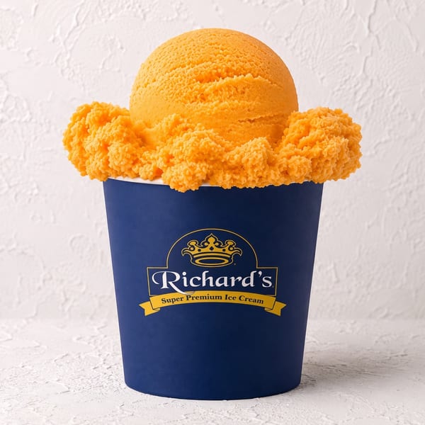 A blue Richard's Super Premium Ice Cream cup filled with bright orange ice cream and crunchy topping.